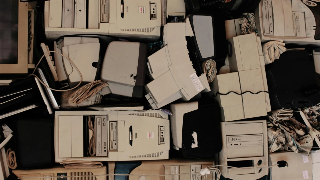 A pile of old discarded computers